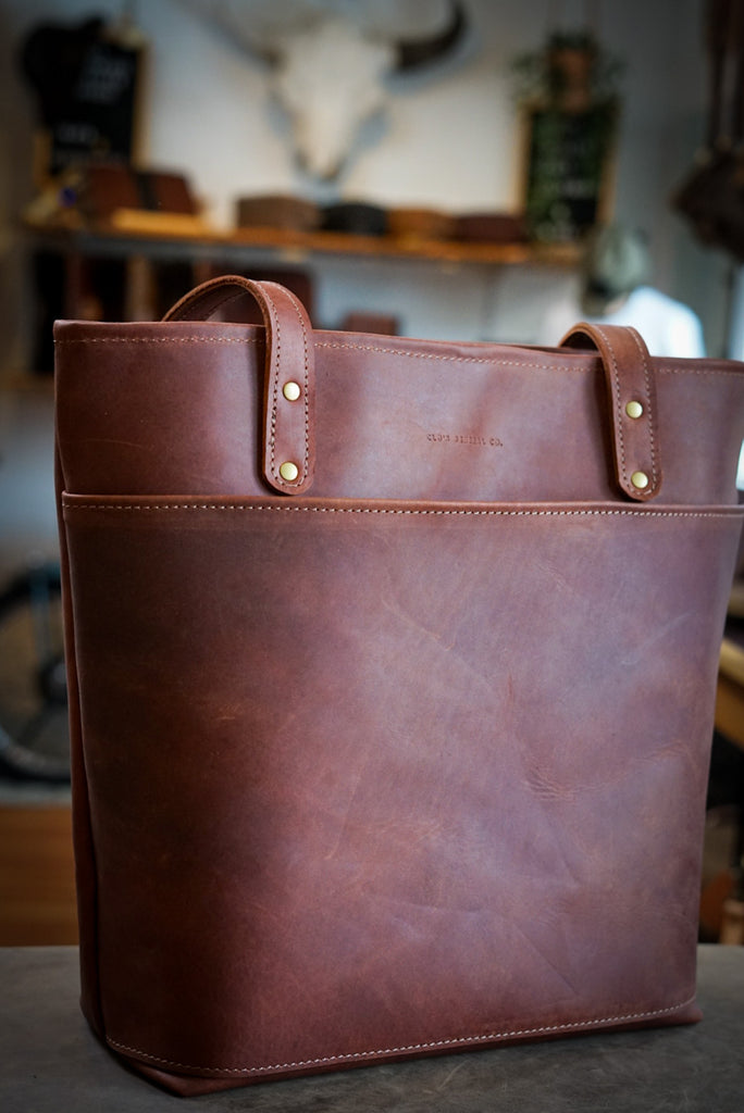 Handmade full grain leather tote in the color oro logger brown